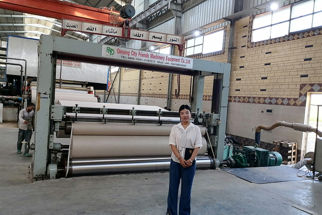 Customer inspecting installation process of facial tissue paper machine at FRD