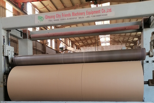 Customer inspecting A4 paper making machine installation at FRD