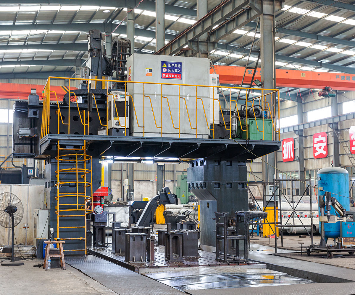 Workers adjusting A4 paper making machine in the factory workshop